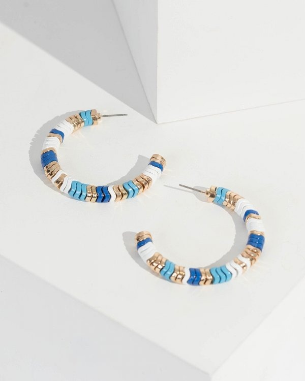 imgi_2_2c37e3de624b6df5665f62dd35c66880.jpg Blue Painted Swirl Hoop Detail Earrings - Image 1